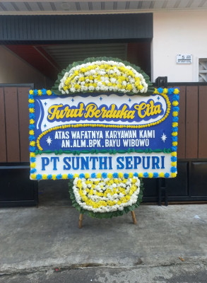 Papan Bunga Duka di Pucuk
