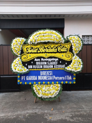 Papan Bunga Duka di Pucuk